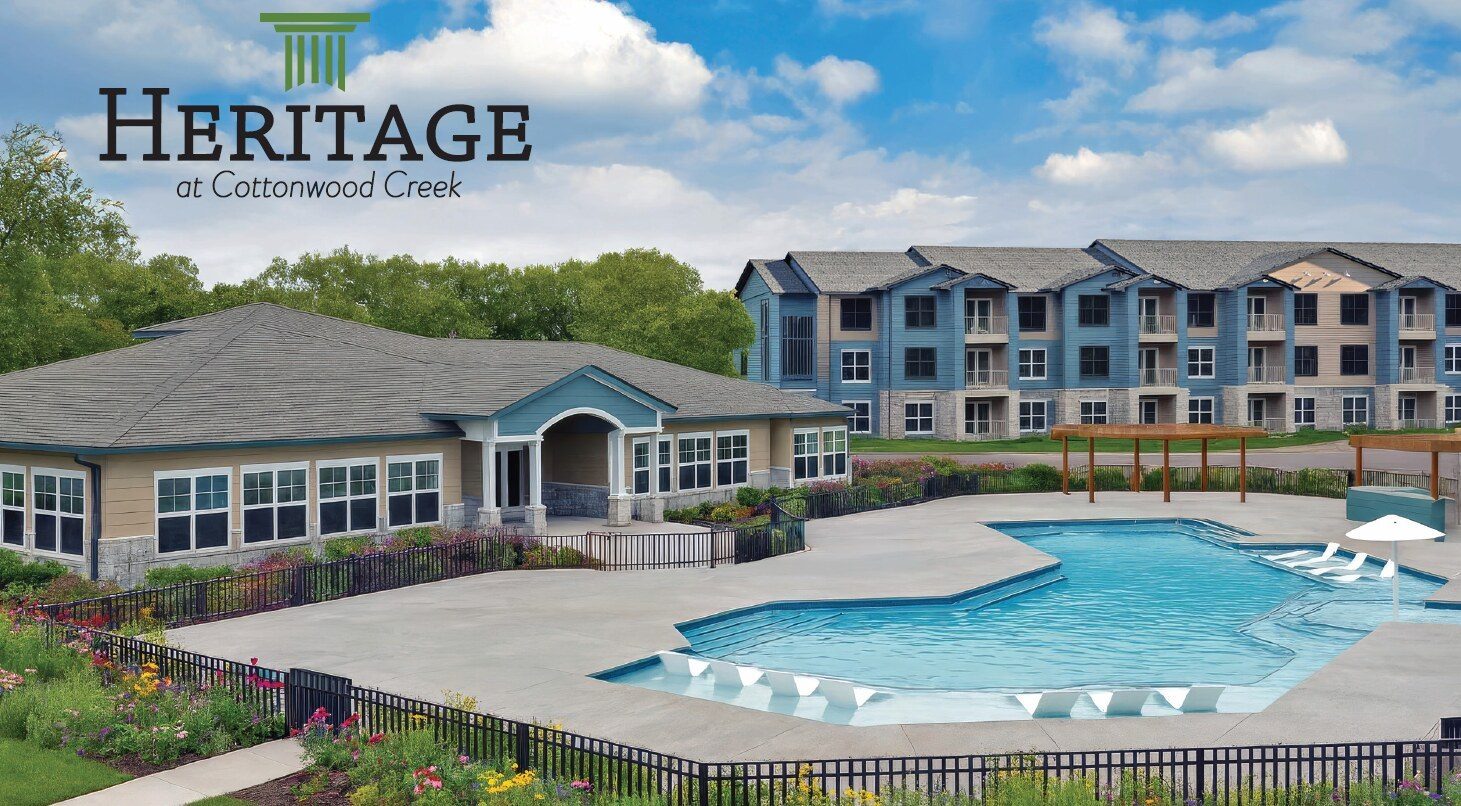 Heritage at Cottonwood Creek family rental community in San Marcos, Texas, showing the apartment exterior and grounds